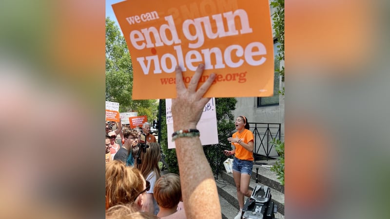 Julia at rally with sign