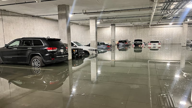 Parking garage flooded after water main break