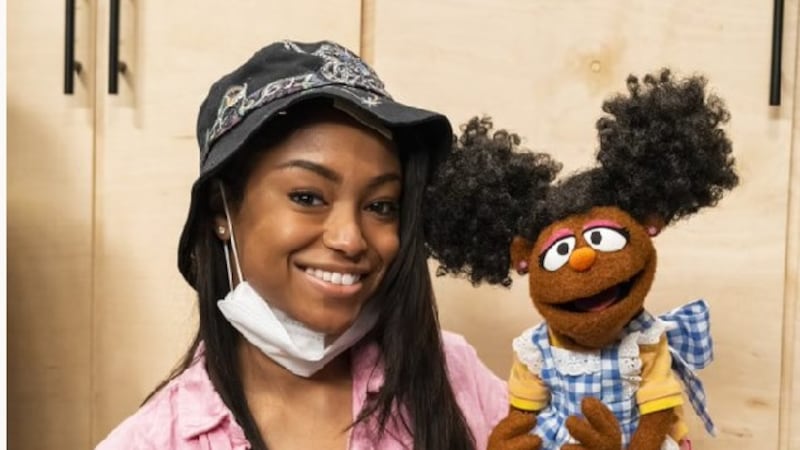 Megan Piphus with her 'Sesame Street' character, Gabrielle.

Credit: "Sesame Workshop / Zach...