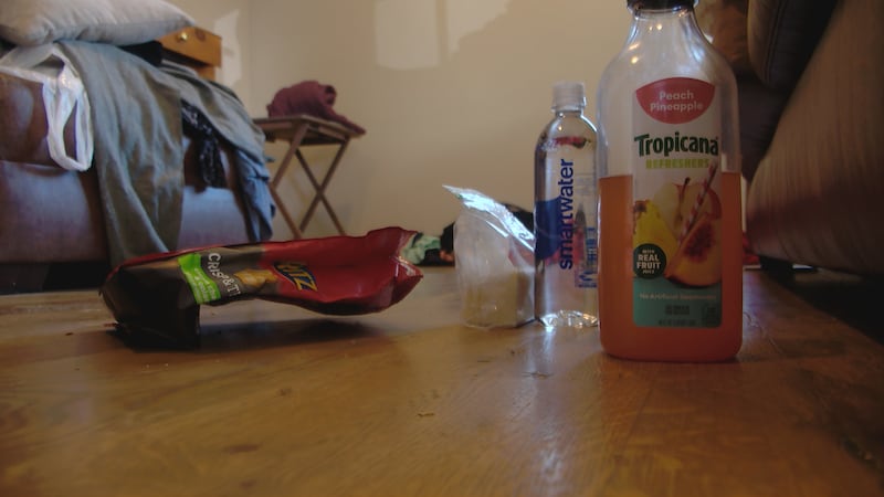 Homeowner says intruder left behind snacks next to the couch.