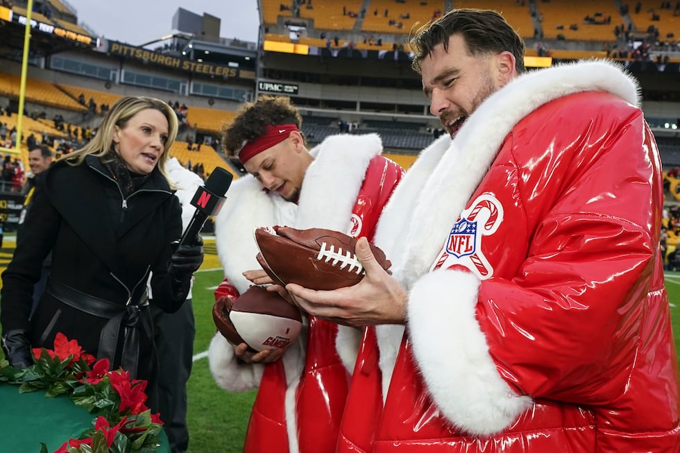 Kansas City Chiefs quarterback Patrick Mahomes and Travis Kelce speak after an NFL football...