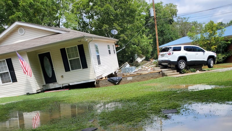 A home is knocked off its foundation on Main Street in Waverly during flooding on Aug. 21, 2021.