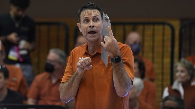 Texas associate head coach Erik Sullivan yells instructions to the team during the Texas...