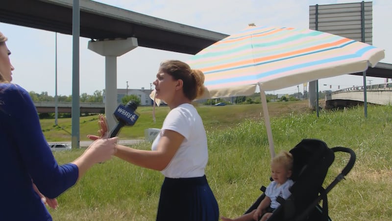 Panhandlers bring small children dangerously close to busy roads.