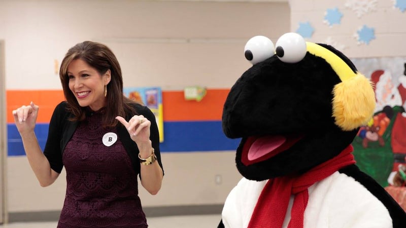 Holly Thompson with the life-size version of Snowbird.