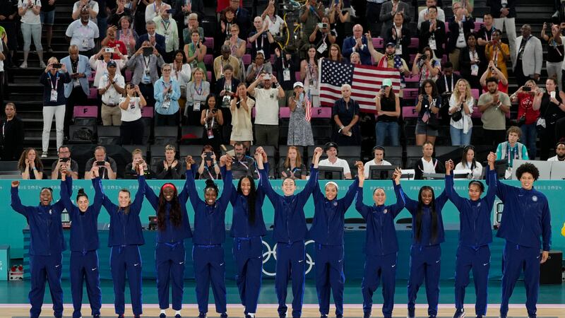 The United States team celebrates their gold medal win at Bercy Arena at the 2024 Summer...