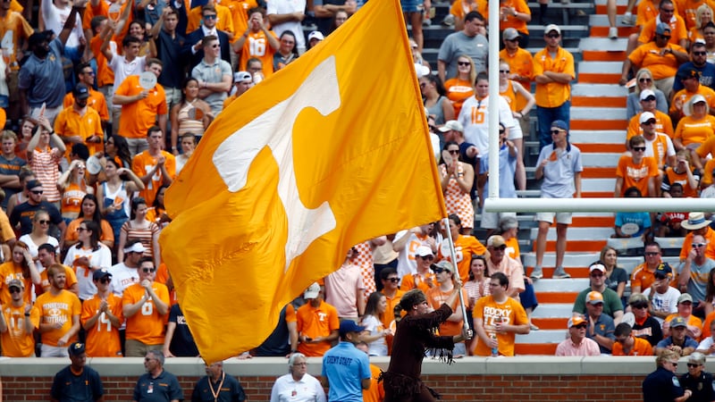 The Tennessee mascot runs across the end zone with a flag after a score in the first half of...