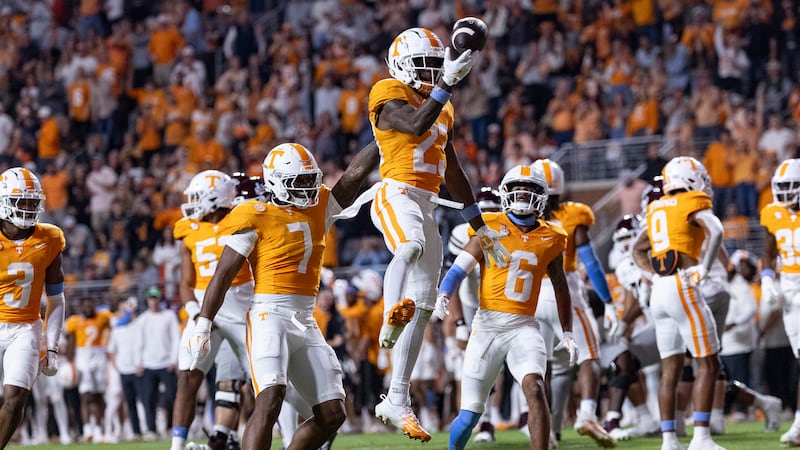 Tennessee defensive back Boo Carter (23) reacts after making an interception during the first...