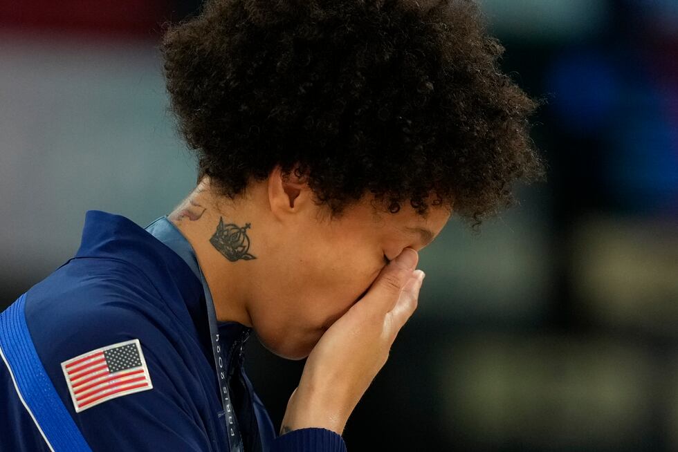 United States' Brittney Griner wipes a tear after a women's gold medal basketball game at...