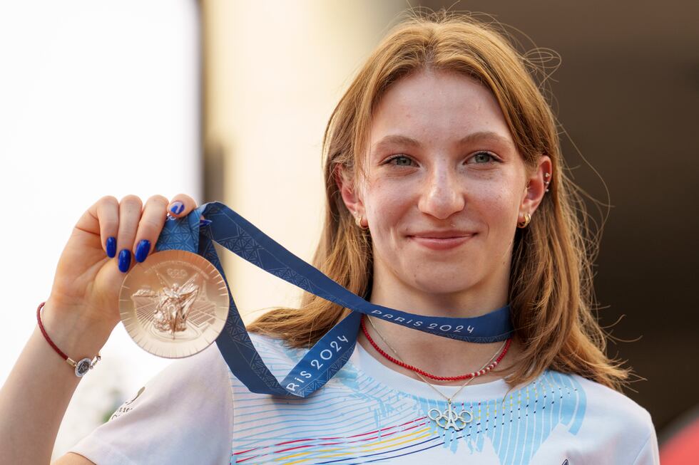 Romanian gymnast Ana Barbosu poses with the bronze medal for her women's artistic gymnastics...