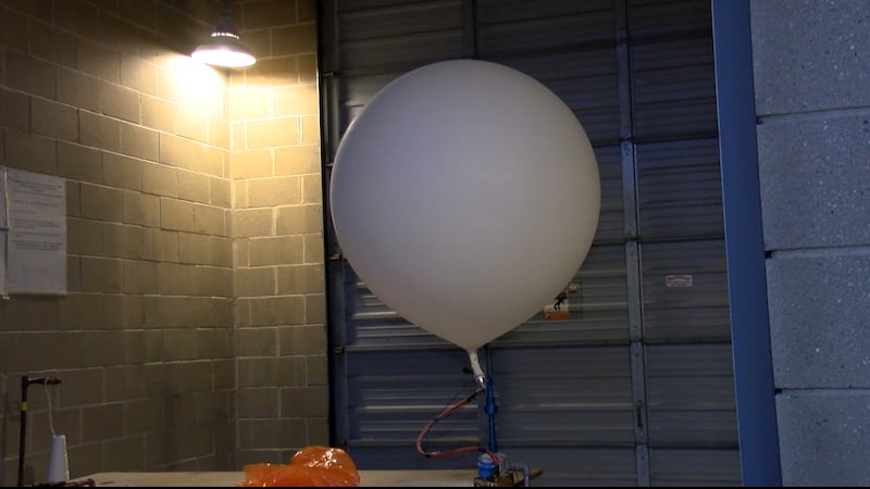 A weather balloon is filled with about 1250 grams of hydrogen gas at the NWS in Chanhassen.