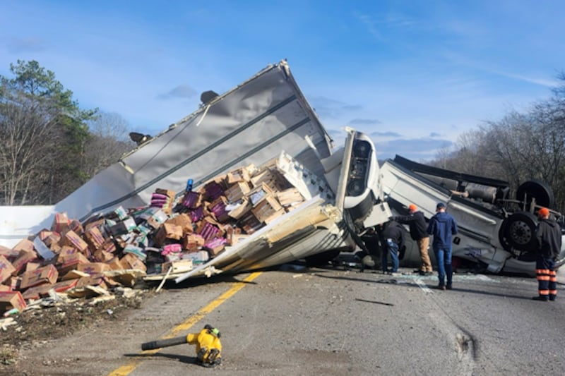 Truck carrying 40,000 pounds of produce overturns on I-40