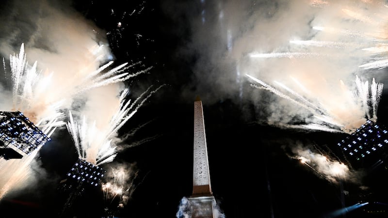 Artists perform with fireworks during the Paris 2024 Paralympic Opening Ceremony at the Place...