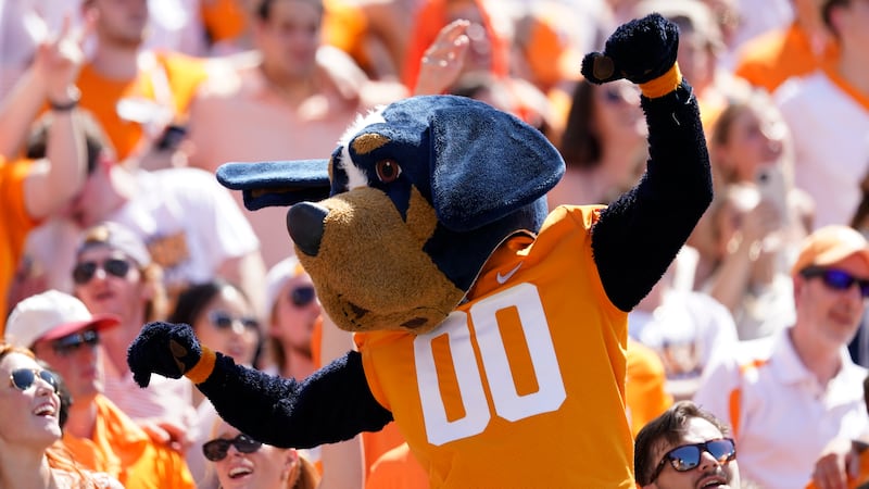 Tennessee mascot Smokey celebrates with fans in the second half of an NCAA college football...