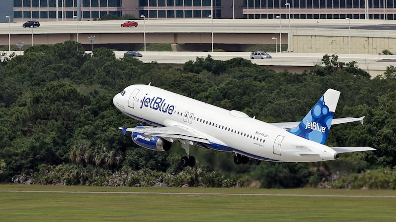 FILE - A JetBlue Airways Airbus A320-232 takes off from the Tampa International Airport in...