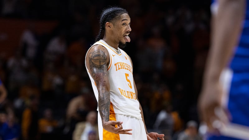 Tennessee guard Zakai Zeigler (5) reacts after teammate Jahmai Mashack's 3-point basket during...