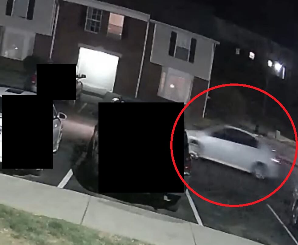 Footage shows the white or silver sedan that the man had interacted with before the robbery.