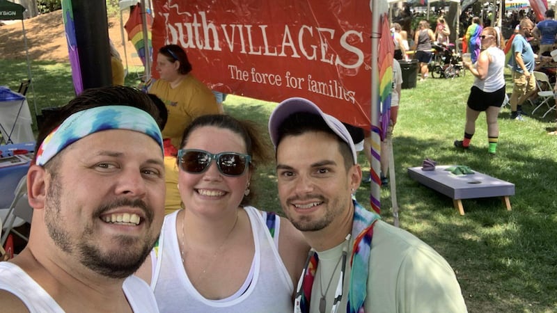 Travis (left) and Michael (right) VanZant pose for a selfie with friend Audra Pieranunzi in...