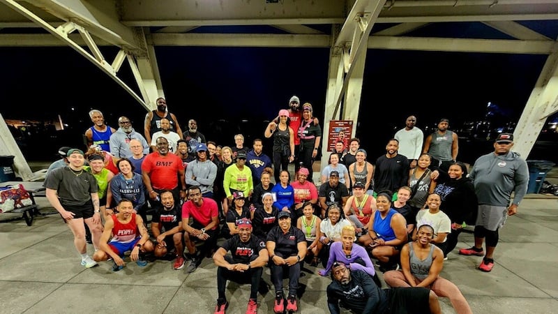 Runners pose for picture ahead of  2 mile run